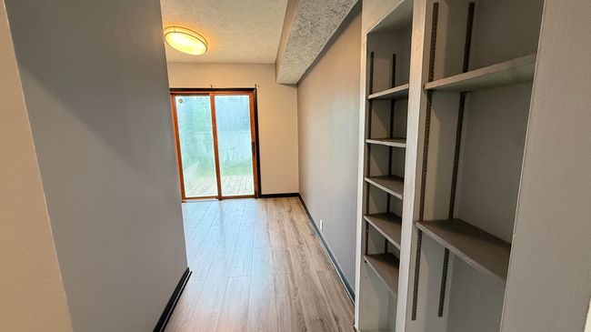 Prior owners used as walk in closet - could use as sitting room or office! | Image 14