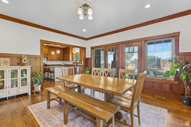 Dining area with crown molding and dark hardwood / wood-style floors | Image 13