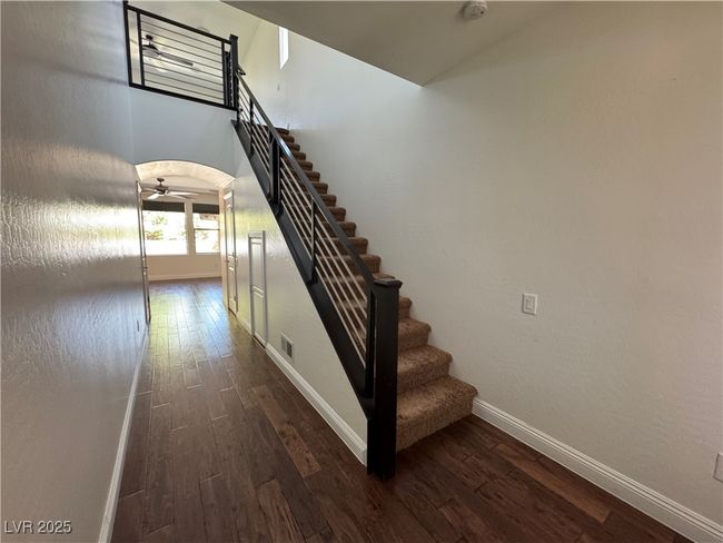 Modern Stairway with wood finished floors | Image 9