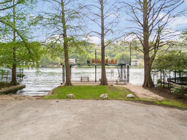Greenshores on Lake Austin residences have a private access to Lake Austin Waters. Bring your boat to Lake Austin. Your own private access, boat ramp, two story boat dock, playscape, beach volley ball area, trailer and water craft parking, boat ramp, picnic area. Living in Greenshores you get the best of both worlds close to downtown, minutes to Skishores Cafe and enjoying Austin lifestyle on its famous Lake Austin waters | Image 40
