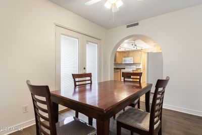 Breakfast room opens up to kitchen and door to outside | Image 3