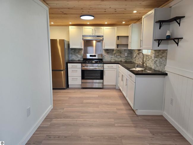 7864 Maple St, House other with 3 bedrooms, 1 bathrooms and null parking in Vanderbilt MI | Image 7