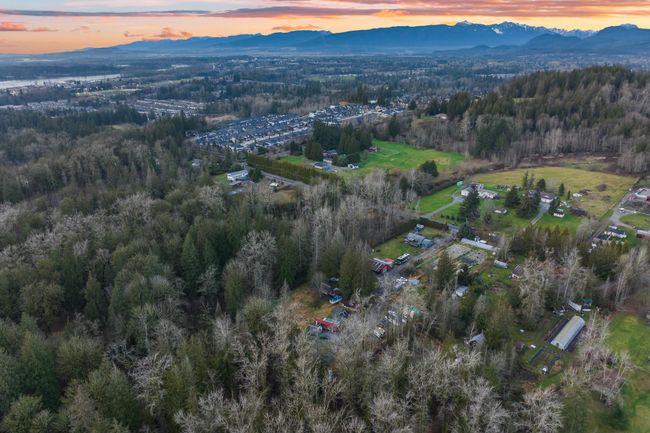 Drone / aerial view with a mountain view and a wooded view | Image 5