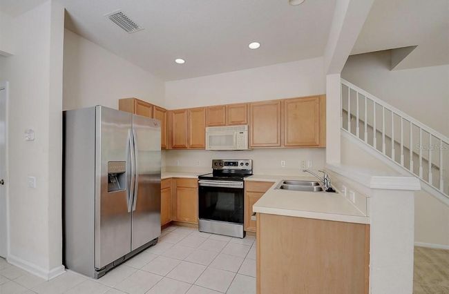 26539 Castleview Way, Townhouse with 3 bedrooms, 2 bathrooms and null parking in Wesley Chapel FL | Image 2