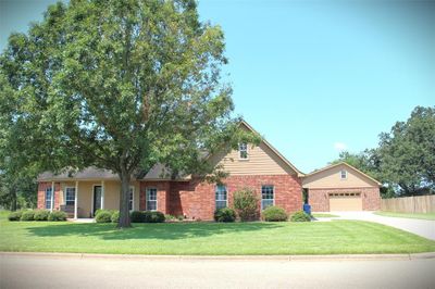 Gated Community with Curbed and paved roads. | Image 3