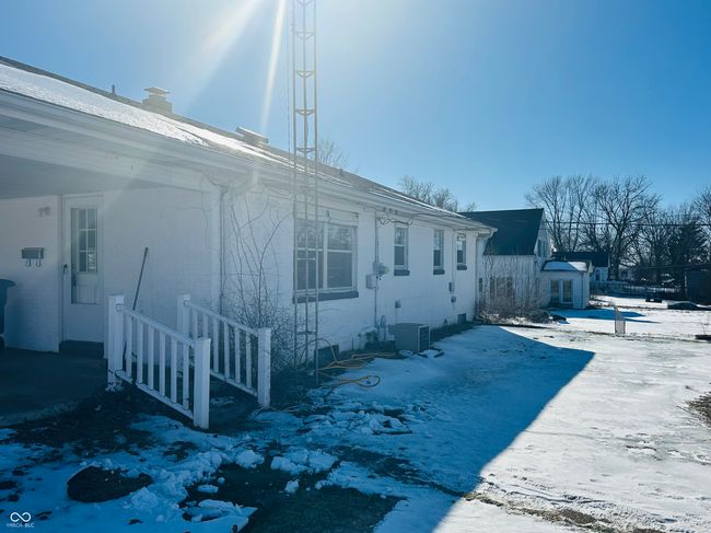 view of yard with a playground and a detached carport | Image 4