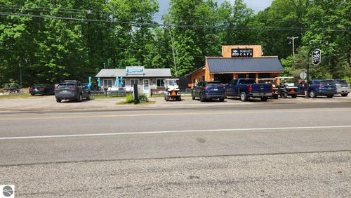 1857 W Higgins Lake Dr, Roscommon, MI, 48653-8189 | Card Image