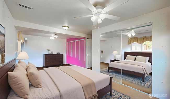 Spacious fourth bedroom or flex space with mirrored closet doors. This photo is virtually staged. | Image 11