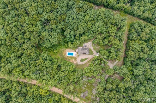 Aerial overview of property's location featuring a forest | Image 88