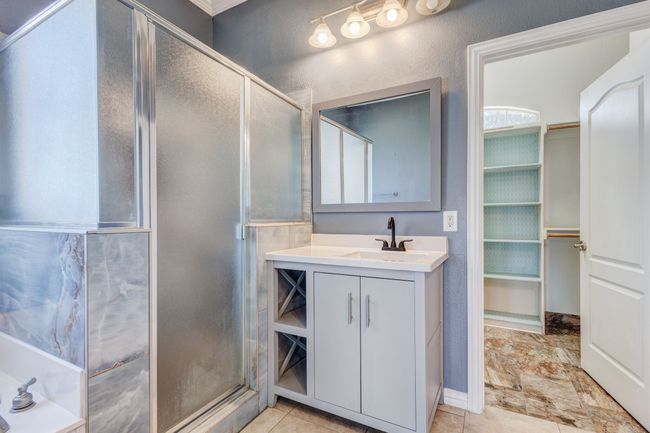 Bathroom with walk in shower and vanity | Image 15