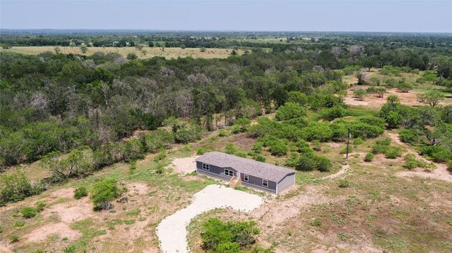 View of subject property featuring a forest | Image 35
