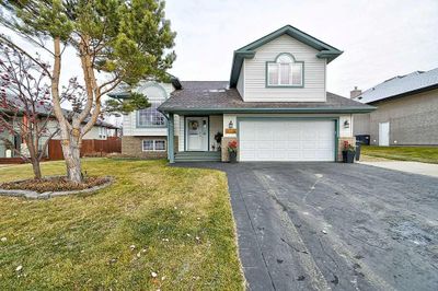 34 Fieldstone Way, House other with 5 bedrooms, 3 bathrooms and 2 parking in Sylvan Lake AB | Image 1