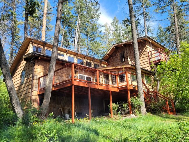 Rear view of house with a deck | Image 104