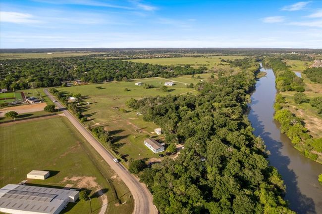 Drone / aerial view featuring a water view and a rural view | Image 9
