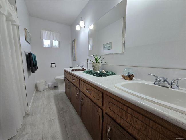 7071 Mc Dougal Pl, House other with 4 bedrooms, 3 bathrooms and 2 parking in Port Hardy BC | Image 32