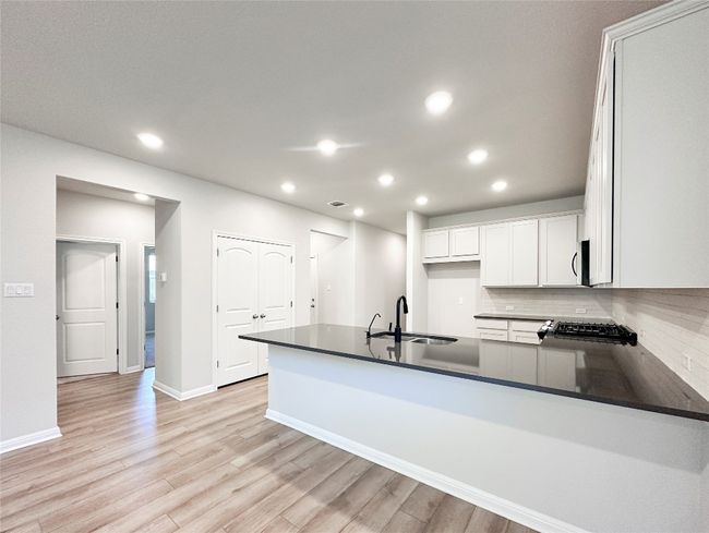 Kitchen look towards the secondary rooms | Image 9