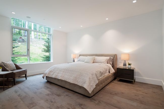 Bedroom featuring multiple windows, recessed lighting, and light wood-type flooring | Image 20