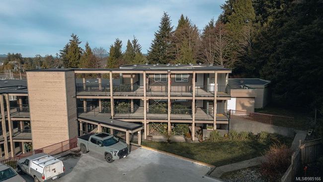 Rear view of house with a balcony | Image 17