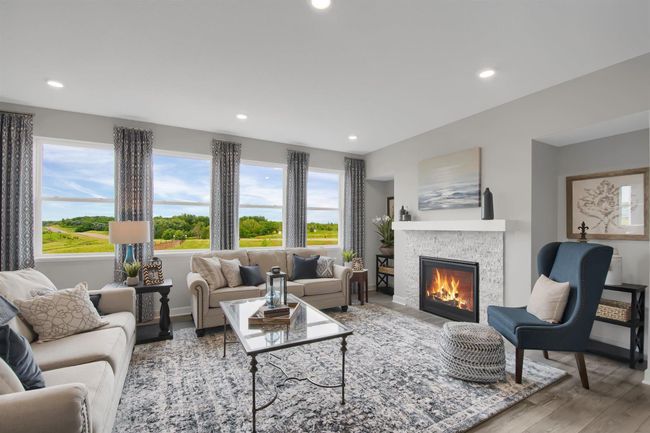 Cozy gas fireplace and space to gather and relax. Model photos. Options and colors will vary. | Image 13