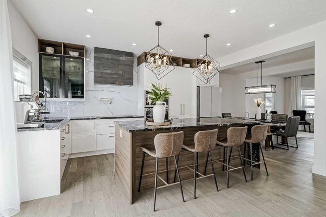 122 Rockywood Cir Nw, House other with 4 bedrooms, 4 bathrooms and 4 parking in Calgary AB | Image 12