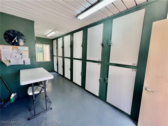 Common laundry room with private storage. | Image 21