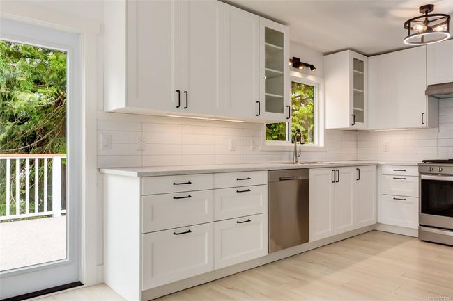 Beautiful kitchen with stainless steel appliances | Image 26