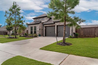 This home is on a corner lot, giving one of the large lots with a lovely side yard, perfect to play ball or run for your fury babies | Image 2