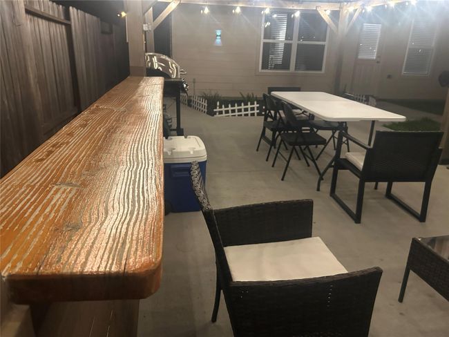 Large bar area for entertaining in the backyard. | Image 26