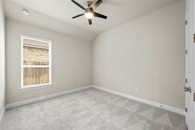 Each bedroom is well-sized and features large closets for ample storage. | Image 25