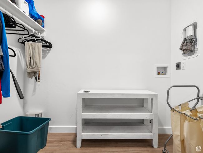 Washroom featuring electric dryer hookup, wood finished floors, and washer hookup | Image 35