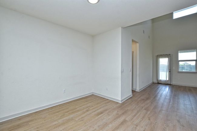 Spare room with light wood-style flooring and baseboards | Image 8