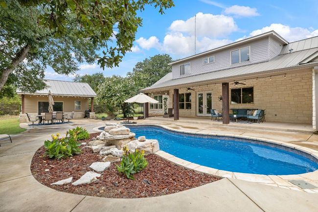 View of pool, casita, and attached oversized patio to the main house. | Image 27