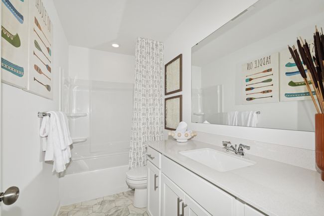 (Photo of decorated model, actual home's finishes will vary) Another secondary bedroom. | Image 16