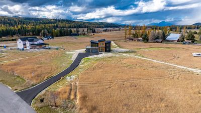 Birds eye view of property with a rural view and a mountain view | Image 3