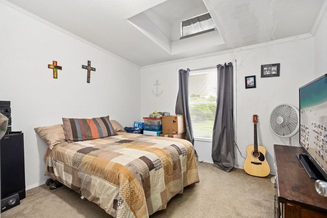 Bedroom 2- only the bedroom have carpets | Image 10