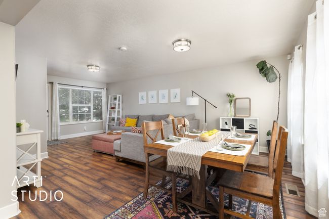Dining area featuring wood finished floors | Image 4