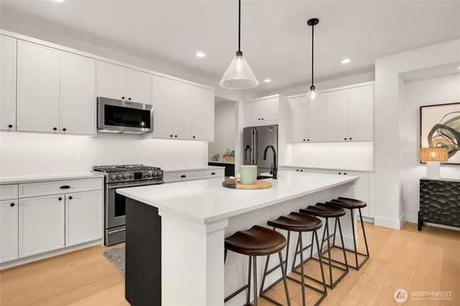 As the newest PNW master-planned community, enjoy 200+ acres of open space, trails & the Coal Trax Mt Bike Park. Soaring ceilings in the great roommake each day worthy of celebration & open floorplan appeals to entertaining. Covered deck & patio. Southern-facing homesites range from the mid600s- 900ks. Enjoy a variety of innovative & distinctive new home options with the best all-season recreation just moments away! Built for the future, indulge in a retreat just 90-min to Seattle. Plans and elevations are artist’s renderings only, may not accurately represent the actual condition of a home asconstructed and may also contain options and upgrades which are not included in the sale. Trailside Homes reserves the right to make changes to the floorplan, specifications, dimensions, design and elevations without prior notice. Stated dimensions and square footage are estimated and should not be usedas representations of the home’s actual size. | Image 16