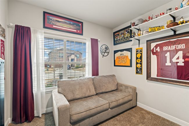 Sitting room featuring a wealth of natural light, baseboards, and carpet | Image 22