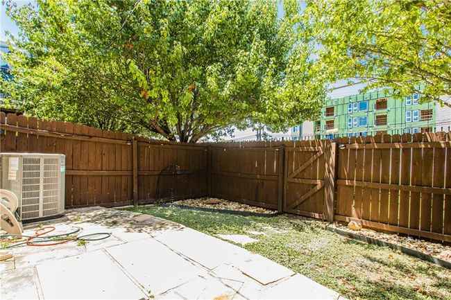 Fenced backyard featuring a patio area | Image 16
