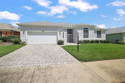 Plenty of Parking off the street. 2 Car Garage. Sidewalks. | Image 3