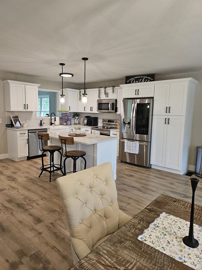 Island great for involving everyone in meal prep. | Image 7