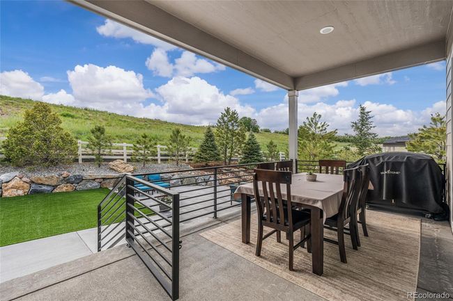 Outdoor patio/dining area with upgraded railing/gate | Image 42