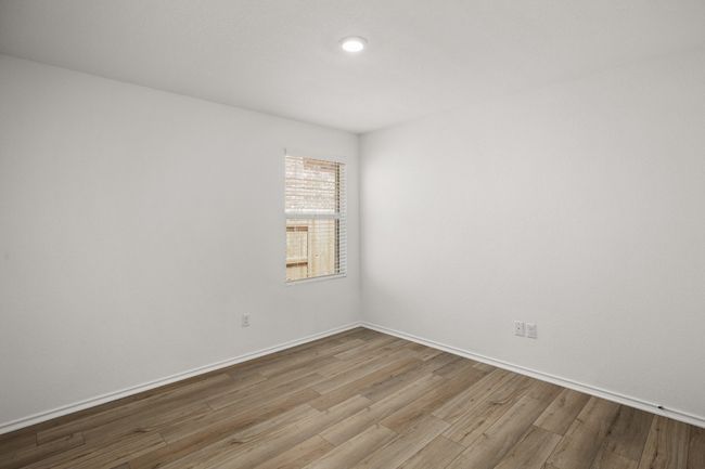 Unfurnished room with wood finished floors and baseboards | Image 19