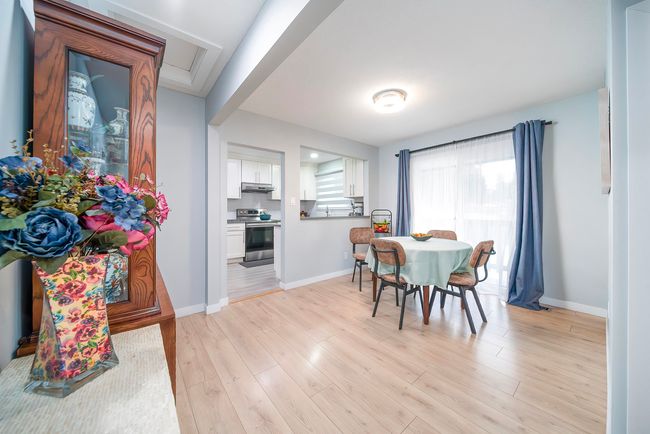 Dining area with baseboards and light wood-type flooring | Image 17