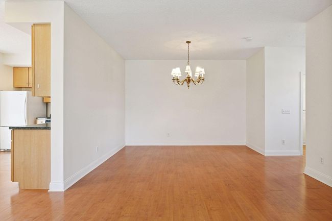Formal dining room that opens to the living | Image 20