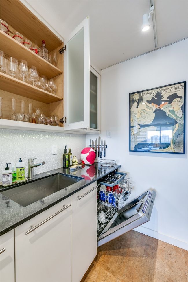 Really solid custom cabinetry with adjustable shelves, BOSCH dishwasher with three racks. | Image 19