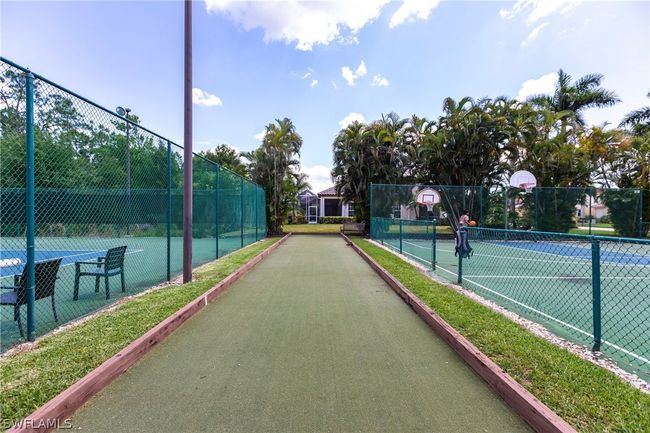 View of sport court featuring basketball hoop | Image 29