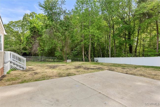View of patio / terrace with a fenced backyard | Image 39