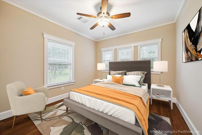 THE VIEWS OUT OF THIS SECONDARY BEDROOM ARE WORTH WAKING UP TO! CROWN MOLDING, WOOD FLOORING AND A CUSTOM CLOSET ARE ALL FEATURES OF THIS BEDROOM WHICH IS SUITED FOR A QUEEN BED AND FURNITURE | Image 35