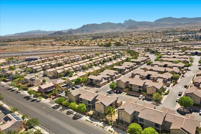 Aerial view of residential area with a mountain backdrop | Image 50